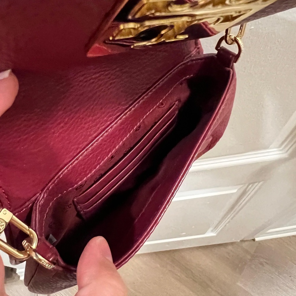 Tory Burch
Tory Burch Burgundy Leather Bitten Clutch Bag - Picture 4 of 9